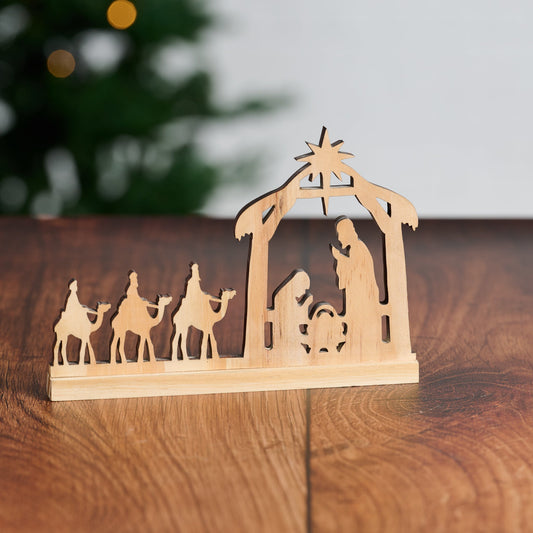 Pine Wood Nativity Cut from a Single Piece with a Praying Family and Wise Men on Camels