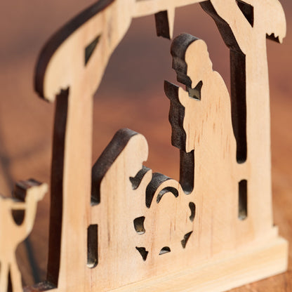 Pine Wood Nativity Cut from a Single Piece with a Praying Family and Wise Men on Camels