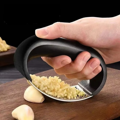 Stainless Steel Garlic Press with Ergonomic Handle for Crushing and Mincing Garlic