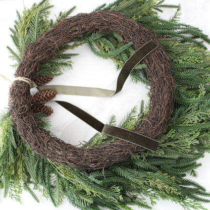 Heart Shaped Pine Wreath with Pinecone Accents and Hunter Green Ribbon