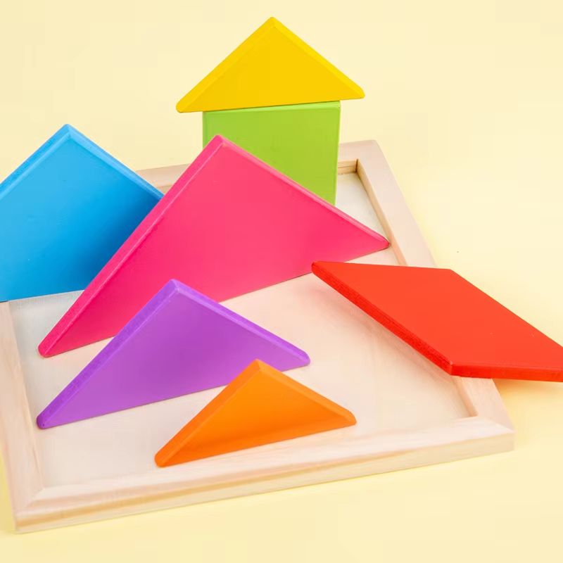Seven Piece Wooden Tangram Set in Bright Colors for Pattern Play At Home Or in Class
