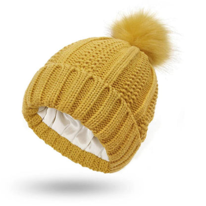Antistatic Pompom Beanie with Silk Lining for Frizz-Free Hair