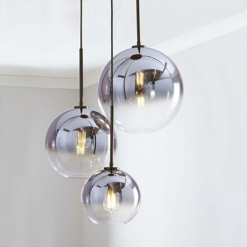 Modern Glass Globe Pendant Light in Brass Design
