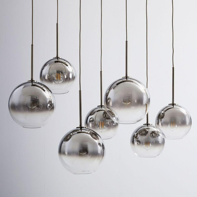 Modern Glass Globe Pendant Light in Brass Design