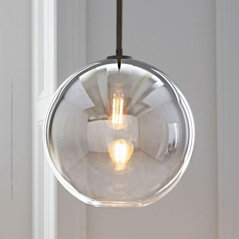 Modern Glass Globe Pendant Light in Brass Design