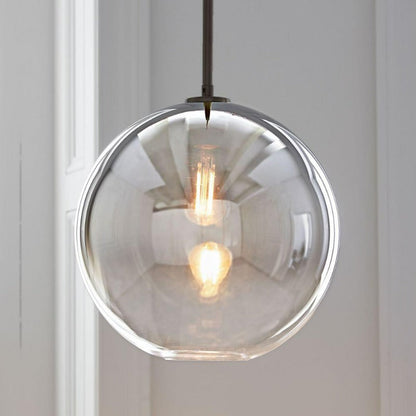 Modern Glass Globe Pendant Light in Brass Design