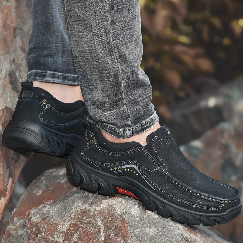 Women's orthopedic black leather boots, promoting a confident stride with superior comfort